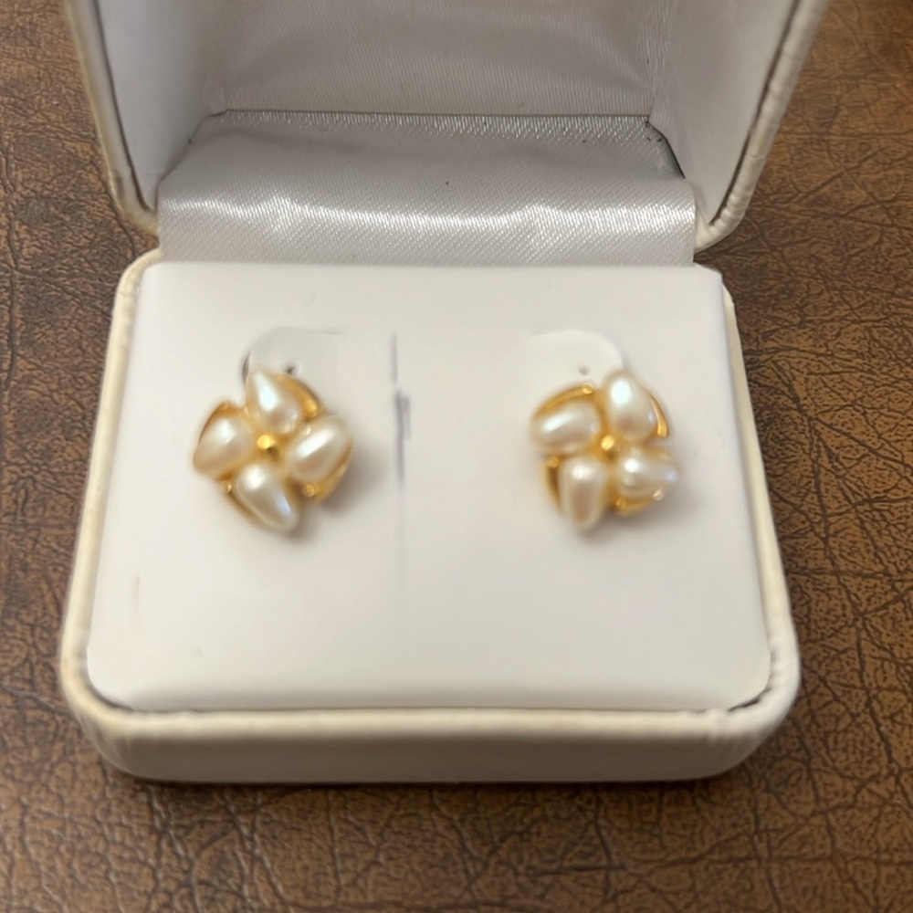 Gold colored costume jewelry clip on earrings with pearls